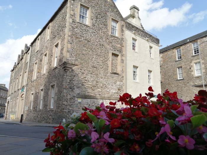 Scottish Borders Flowers Stone building Hawick blue skies