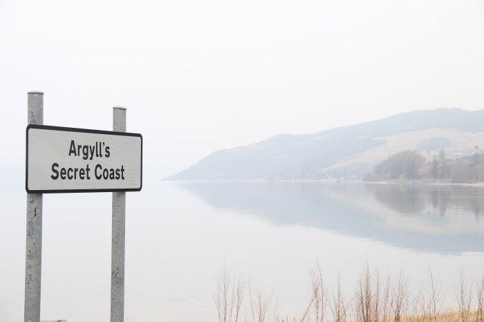 sign water reflections mist