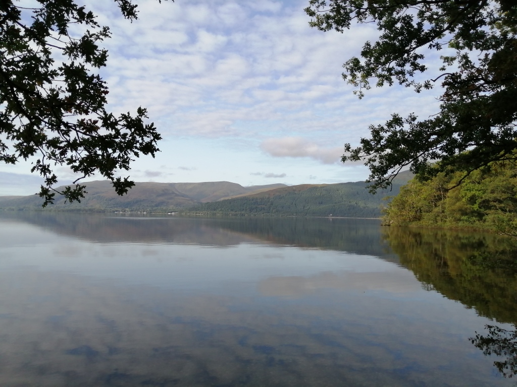 west highland way, scotland, loch lomond, open water, blue skies, reflections, trees