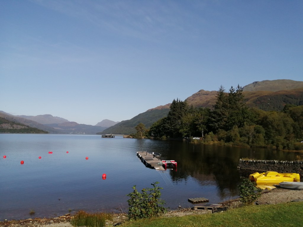 west highland way, scotland, loch lomond, ben lomond, blue skies, mountains, hills, open water, reflections