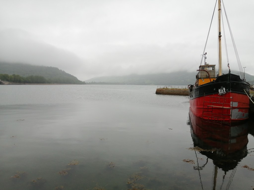scottish loch, reflections, boat reflections, hills