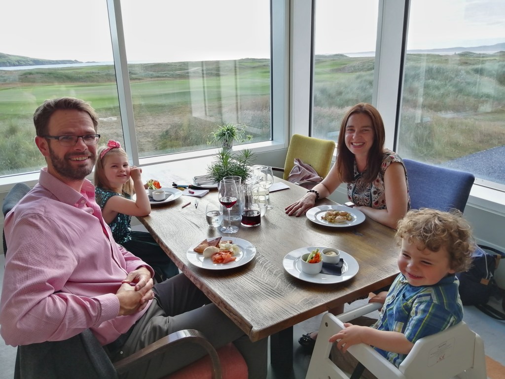 restaurant, smiling family, food, children, view golf course, wine, machrie hotel, islay, scotland
