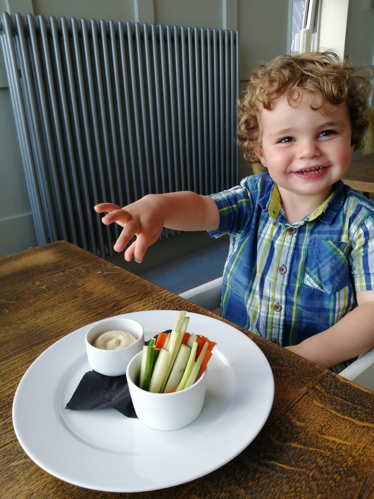 smiling boy, carrots and dips, machrie hotel, islay, scotland