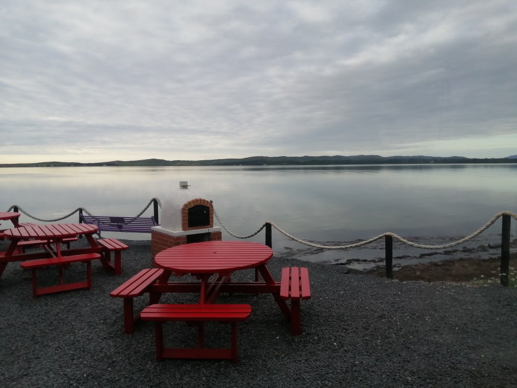peatzeria, open water, wooden bench, pizza oven, bowmore, islay, scotland