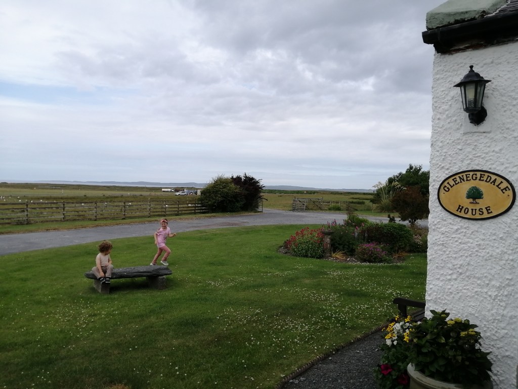 children playing, glenegdale house, flowers, islay, scotland