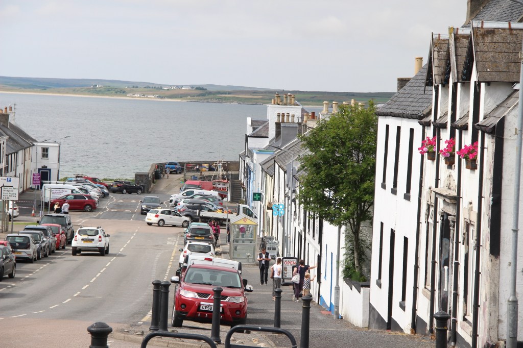 seaside village, bowmore, white houses, village high street, open water, islay, scotland