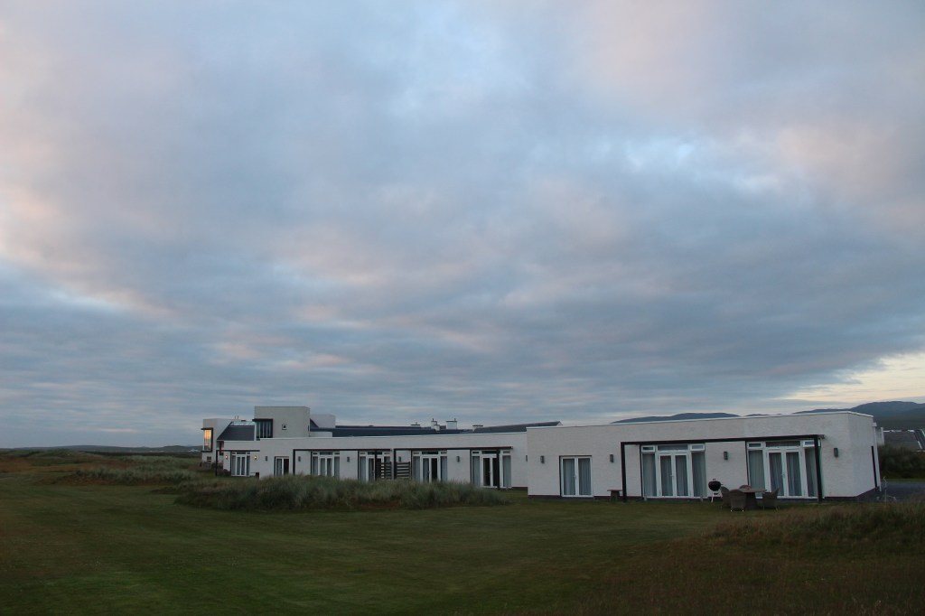 Machrie Hotel Lodges, white building, sunset, colourful clouds, islay, scotland