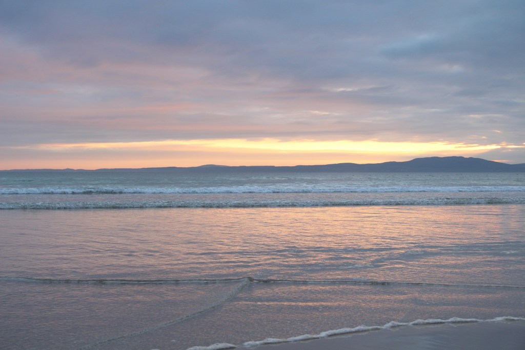 sunset, open water, colourful skies, colourful clouds, reflections, laggan bay Islay, scotland