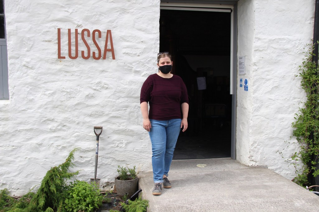 lussa sign, lady in mask, lussa gin, jura, scotland