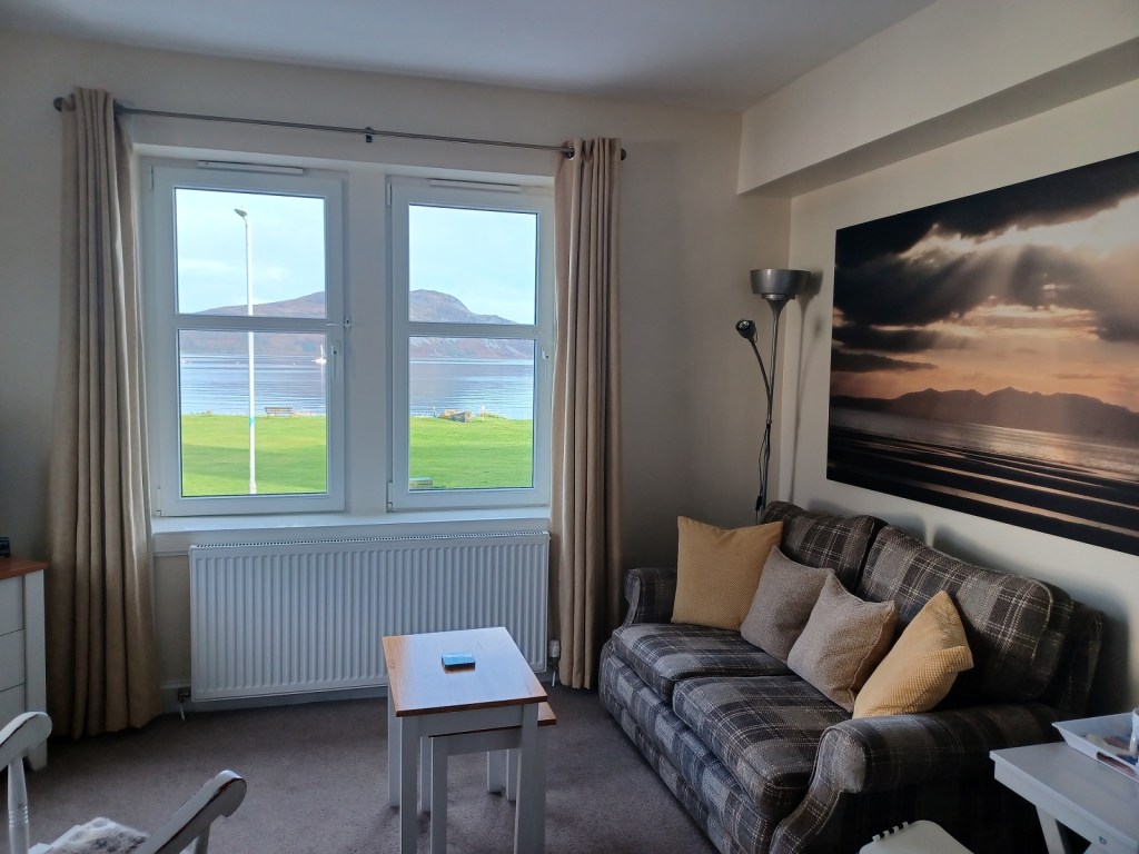 hotel room, window, island, sofa