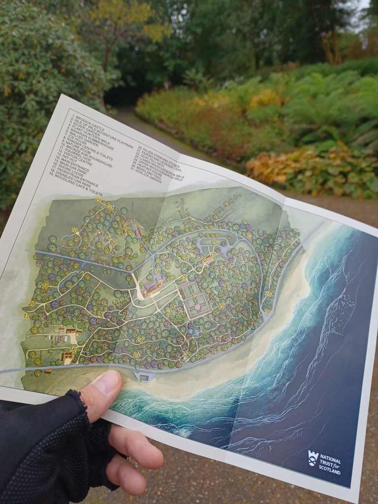 garden map, brodick castle estate garden, hand holding map